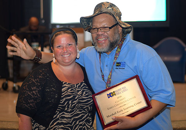 NNPS employees receiving a Clean School Award.