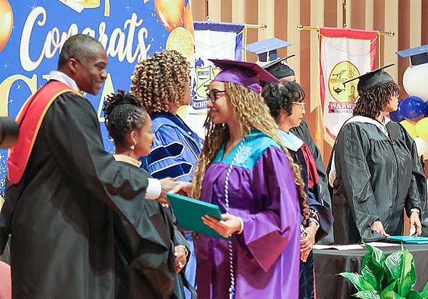 Jubilant summer graduates turn their tassels
